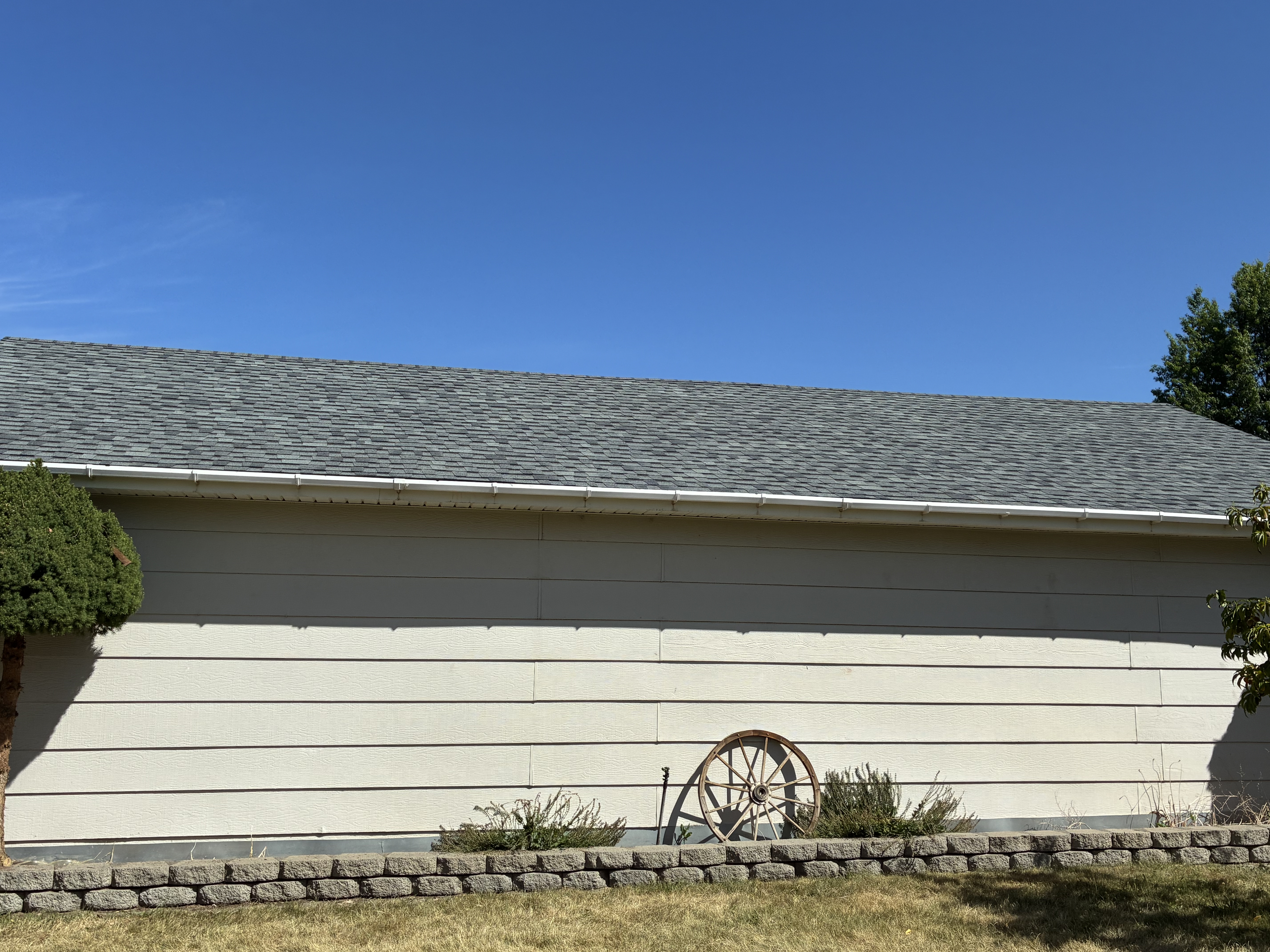 Same garage after new architectural shingle roof installation by Santini Construction